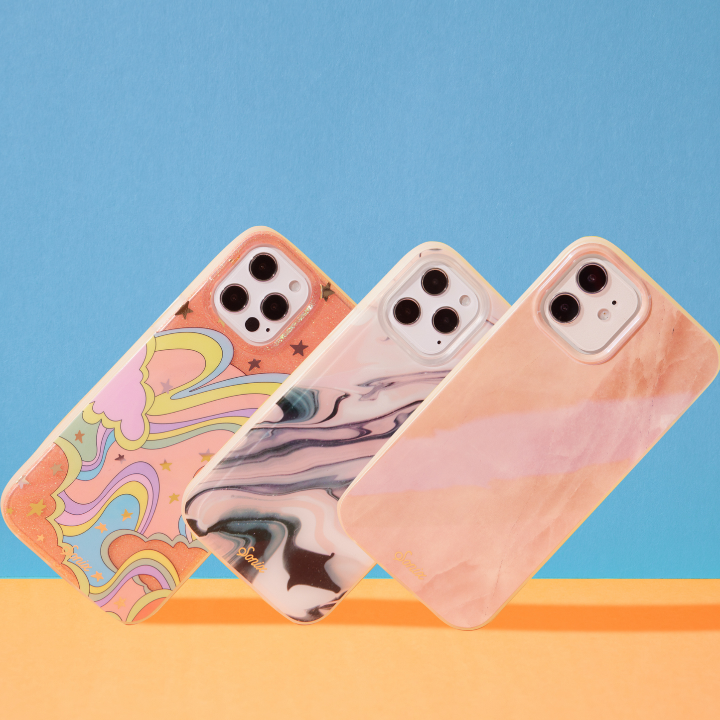 illusion, agate, and pearl tort shown on iphones with a blue background