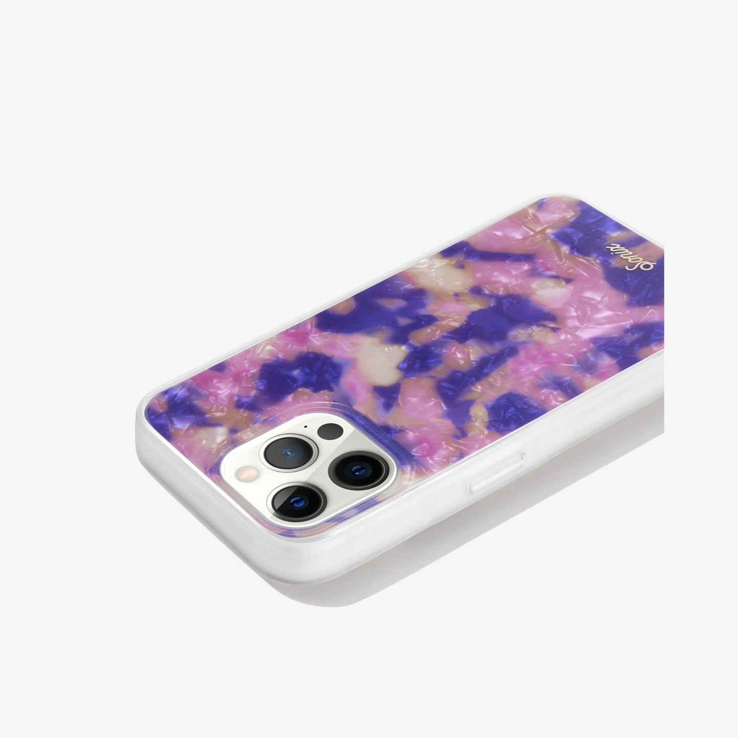 hazy illusion of pink, purple, and orange to create an appearance of a colorful mirage shown on an iphone 13 pro side view