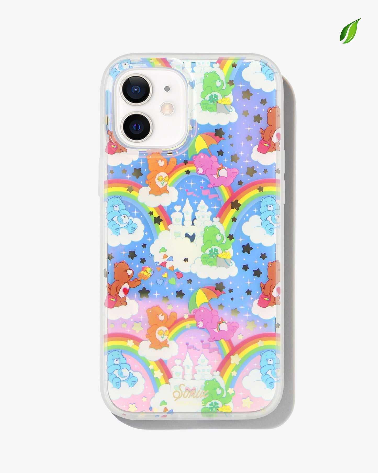 Care Bears: Friend Bear, Cheer Bear, Bedtime Bear, Goodluck Bear, and Tenderheart Bear having fun in a sandcastle dream with stars and rainbows shown on an iphone 12