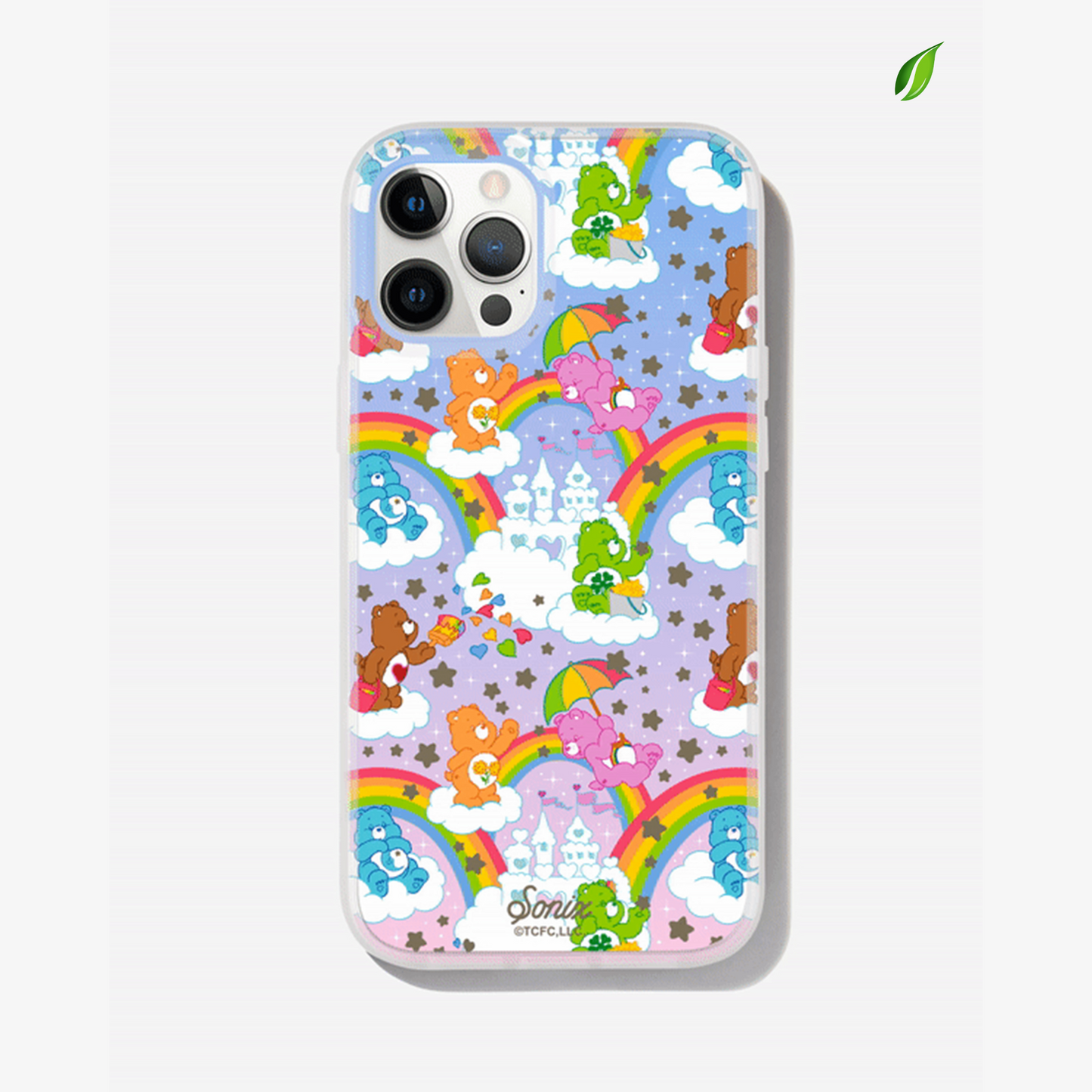 Care Bears: Friend Bear, Cheer Bear, Bedtime Bear, Goodluck Bear, and Tenderheart Bear having fun in a sandcastle dream with stars and rainbows shown on an iphone 12 pro