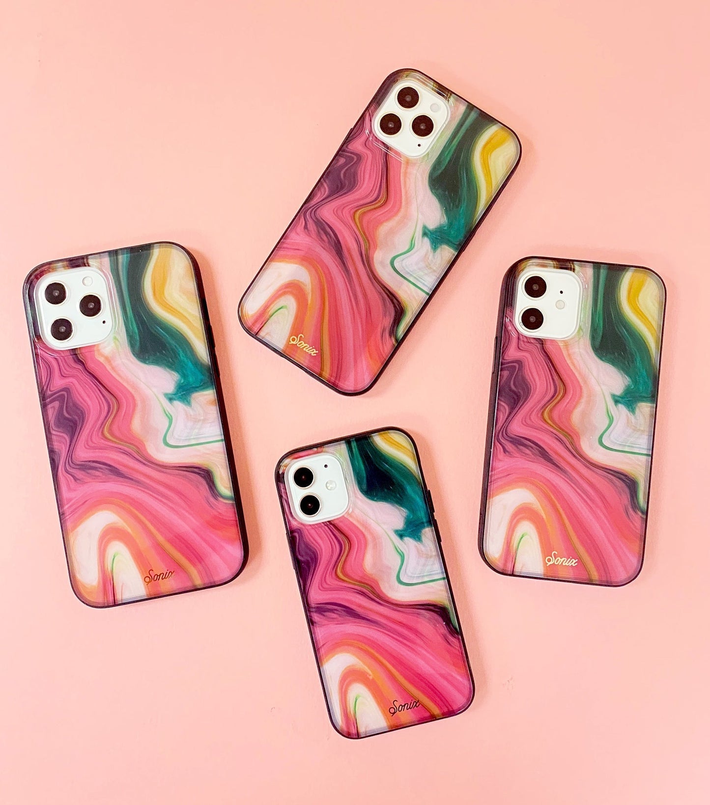 Quartz iPhone 12 Case. Features a marbled print with a black bumper.