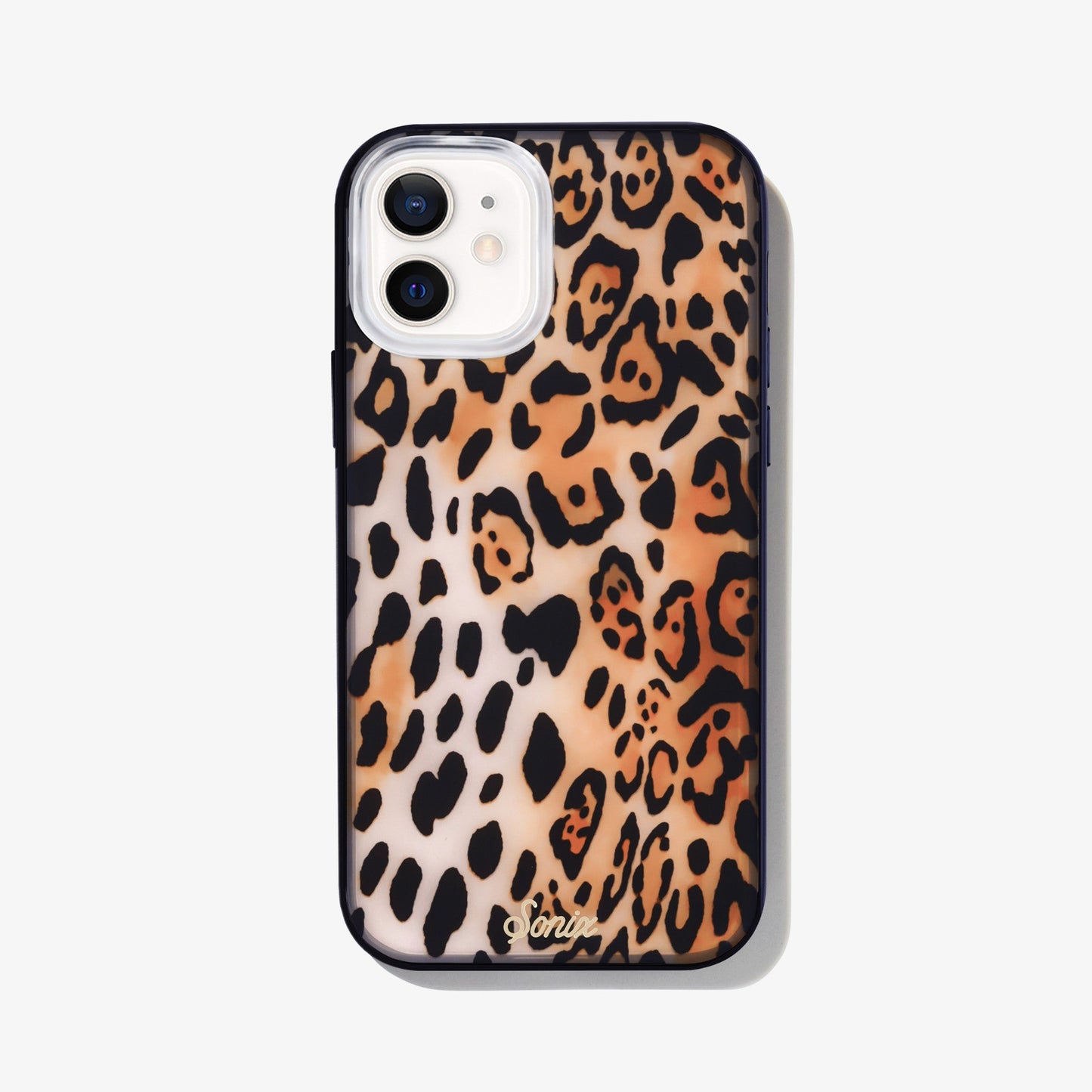 Leopard print case with black bumper modeled on a white iphone 12 pro