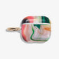 shades of red, blue, green, orange, yellow, and purple, marbled print shown on 3rd gen airpods