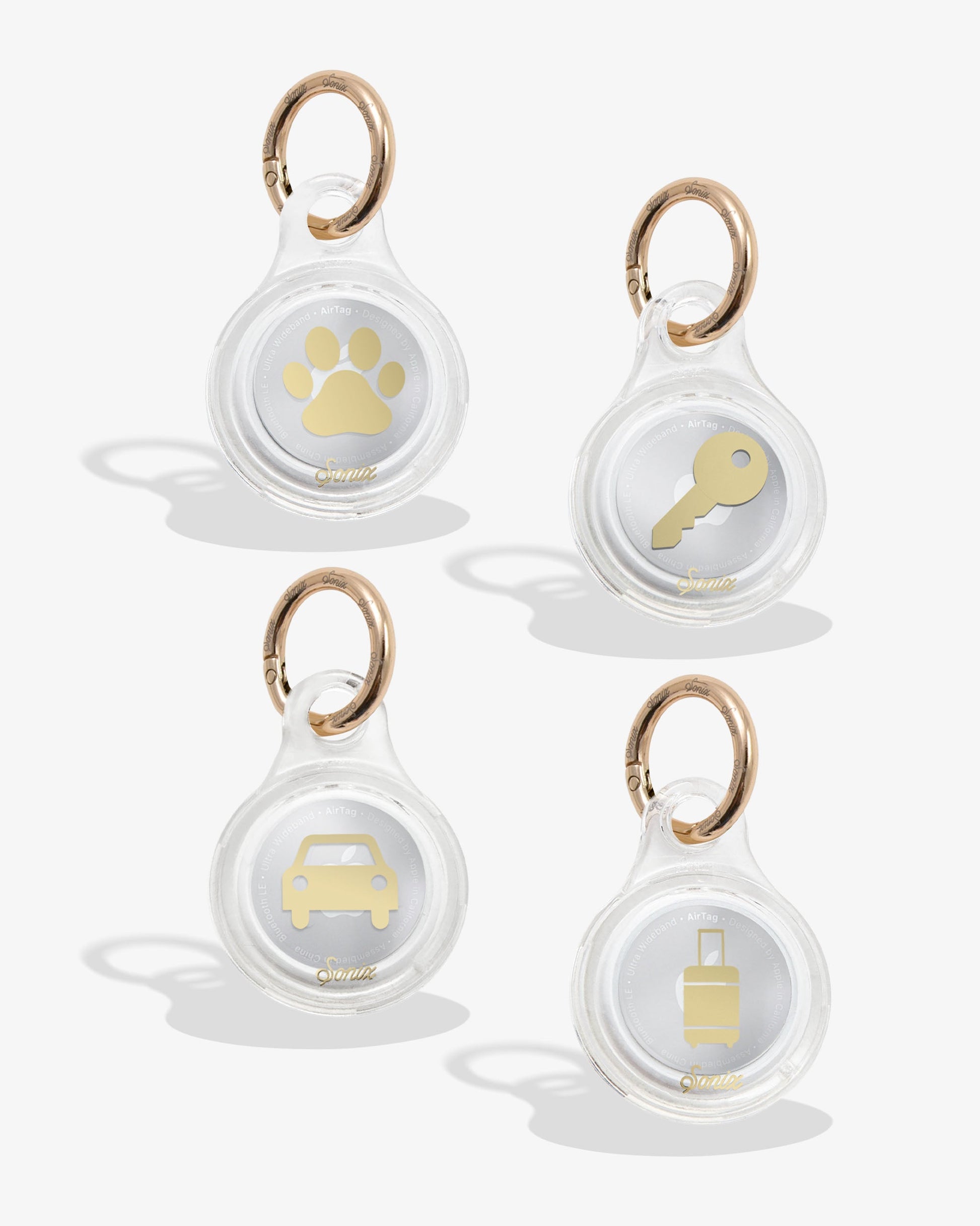 clear air tag cover with gold foil paw print, clear air tag cover with gold foil key, clear air tag cover with gold foil car, clear air tag cover with gold foil luggage