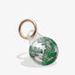 clear airtag case with green palm leaves with gold foil detail