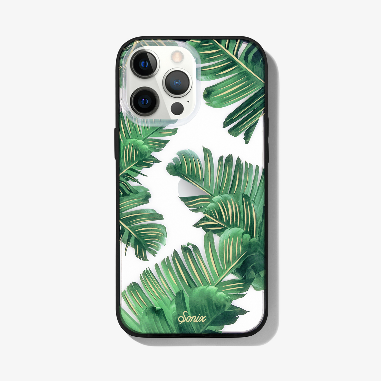 Bahama palm leaves iPhone 13 pro max phone case on white phone.