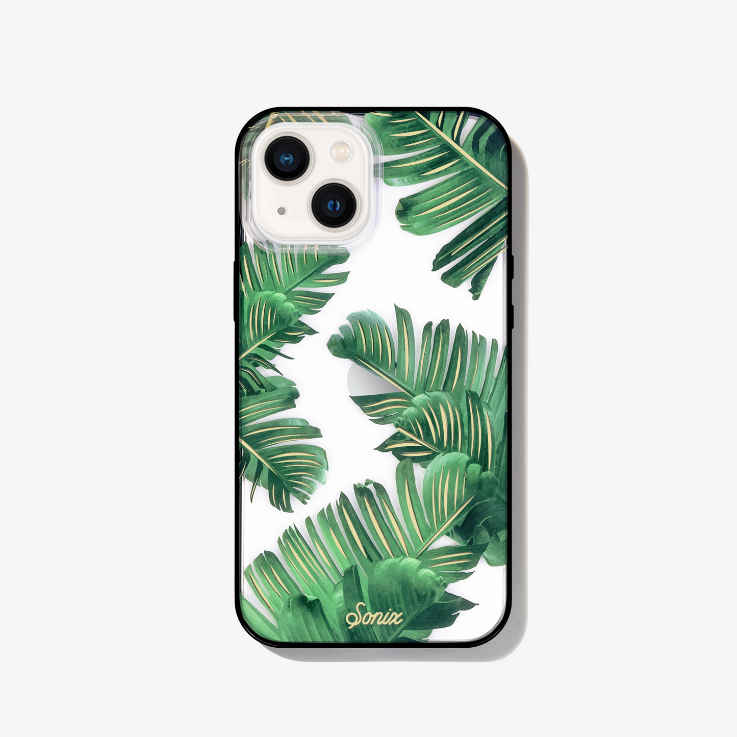 Bahama palm leaves iPhone 13 phone case on white phone.