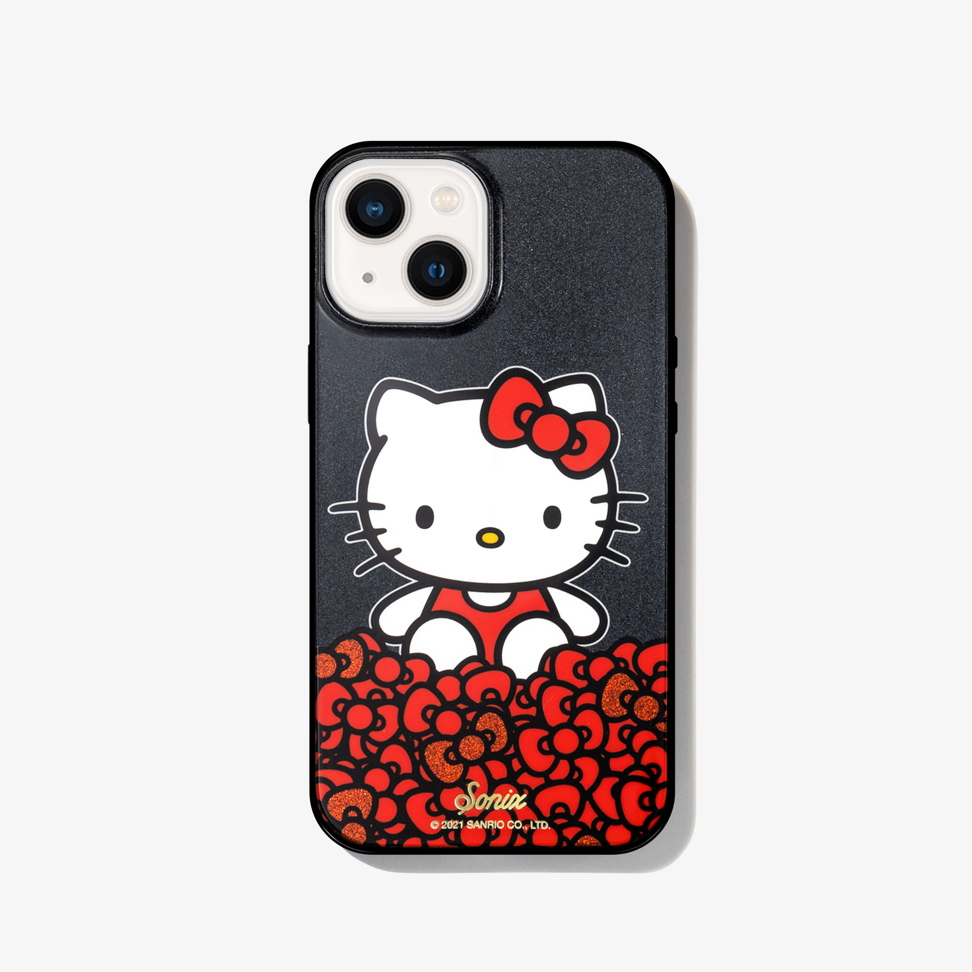 black glitter and Hello Kitty sitting on a bundle of her iconic red bows shown on a iphone 13