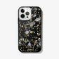 Dark galaxy rocks with highlights of gold and white on a black base.case shown on an iphone 12 pro 