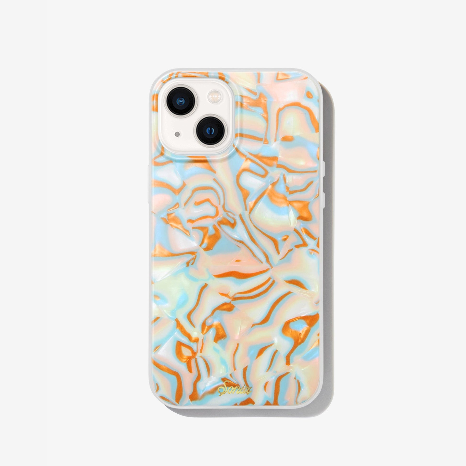 metallic oranges, blues, and cream colors in a wavy 70's pattern shown on an iphone 13