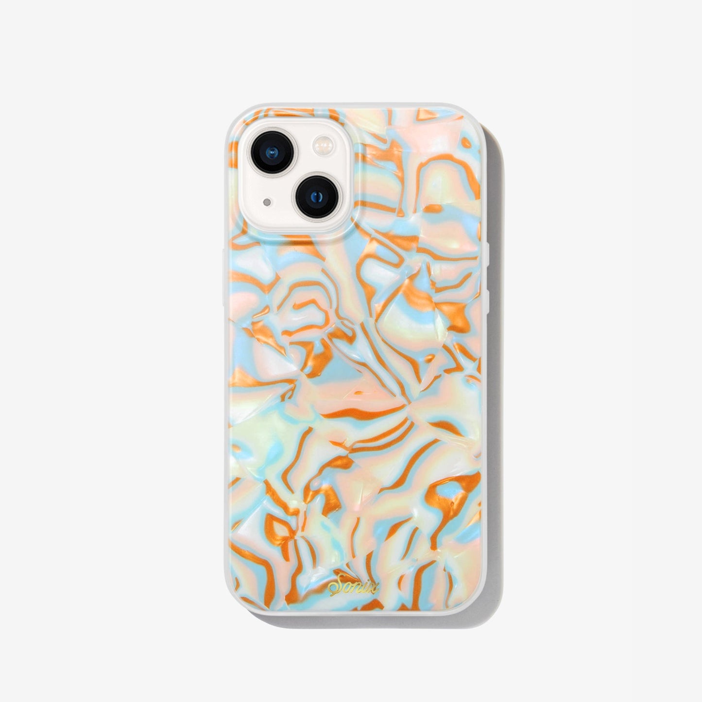 metallic oranges, blues, and cream colors in a wavy 70's pattern shown on an iphone 13