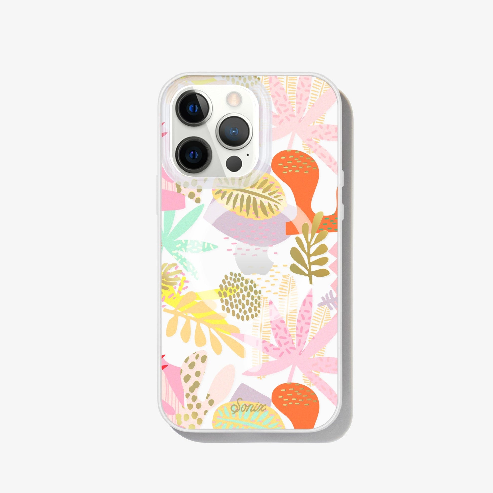 a collection of earthy shapes and forms, like plants and flowers to create a composition of playful abstract art with gold foil details shown on an iphone 13 pro