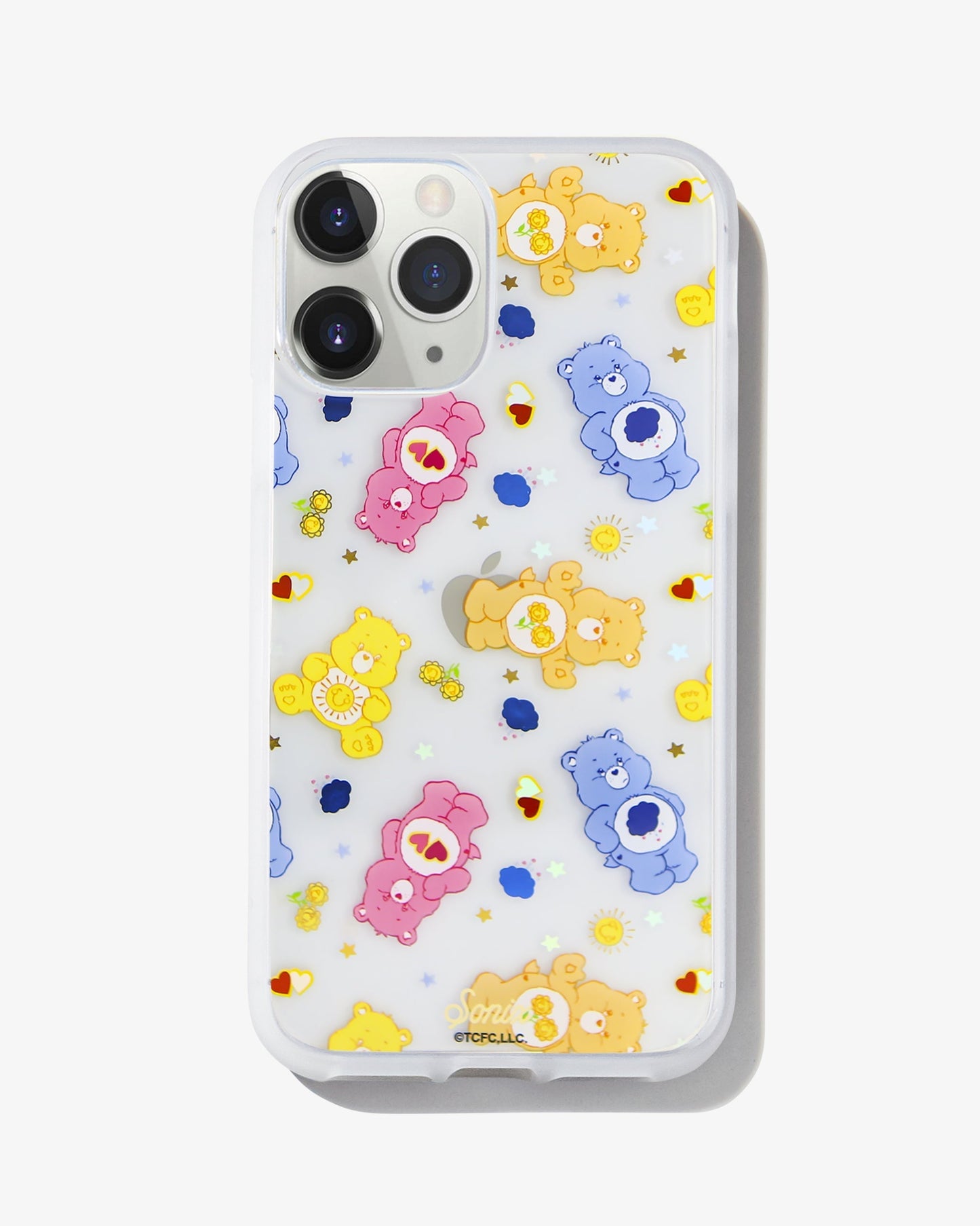 Care Bears: Love-a-lot, Grumpy, Funshine, and Friend Bear, with colorful mini playful icons shown on an iphone 11 pro