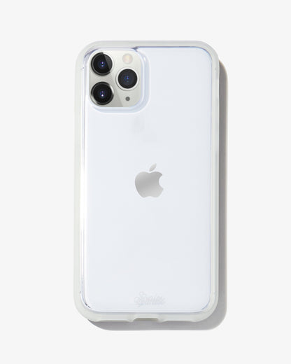 a clear case featuring a glow-in-the-dark bumper shown on an iphone 11 pro