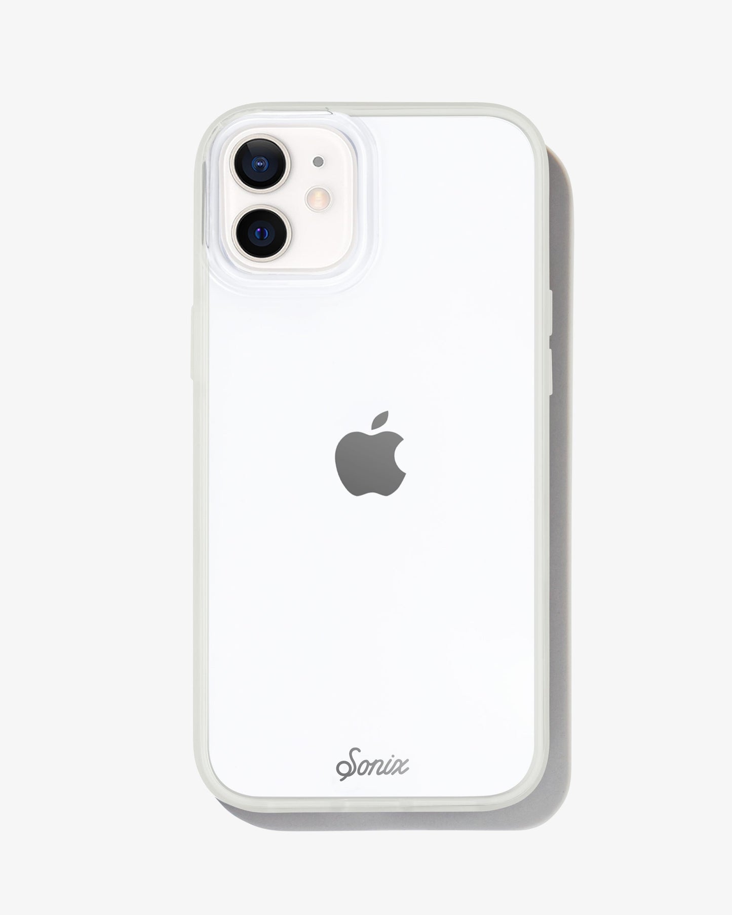 a clear case featuring a glow-in-the-dark bumper shown on an iphone 12