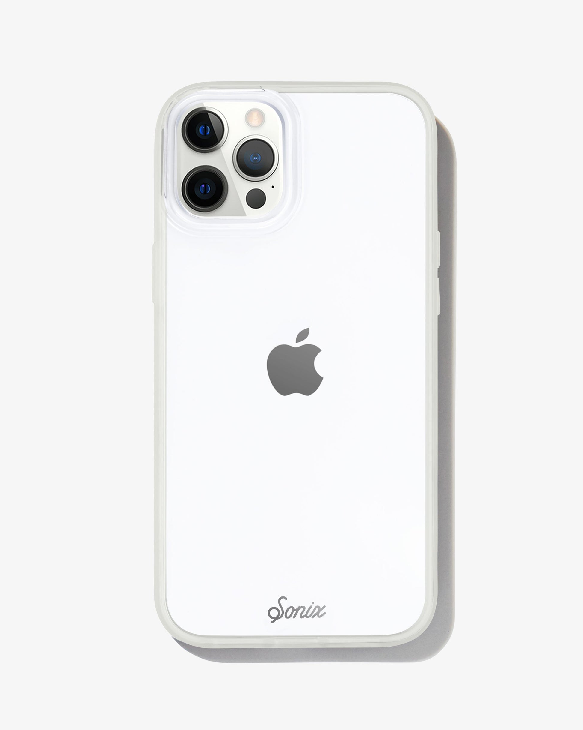 a clear case featuring a glow-in-the-dark bumper shown on an iphone 12 pro