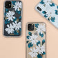 delicate white flowers with gold foiled pollen details shown on galaxy phone