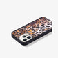 Leopard print case with black bumper modeled on a white iphone 12 pro